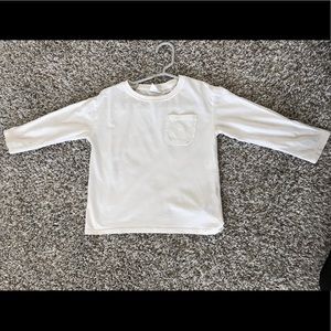 Zara ivory color long sleeves with a cute little pocket. Size 4-5 years old.